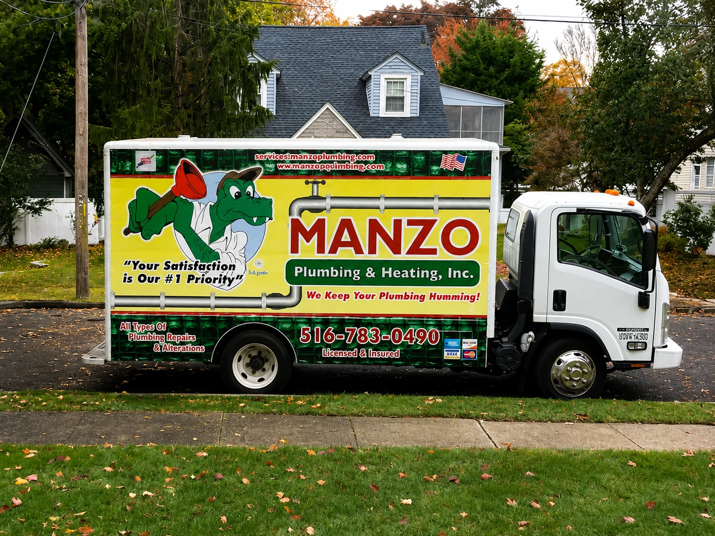 Manzo Plumbing and Heating service truck serving homes across Long Island